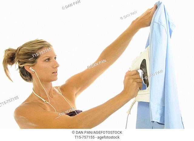 woman ironing a shirt