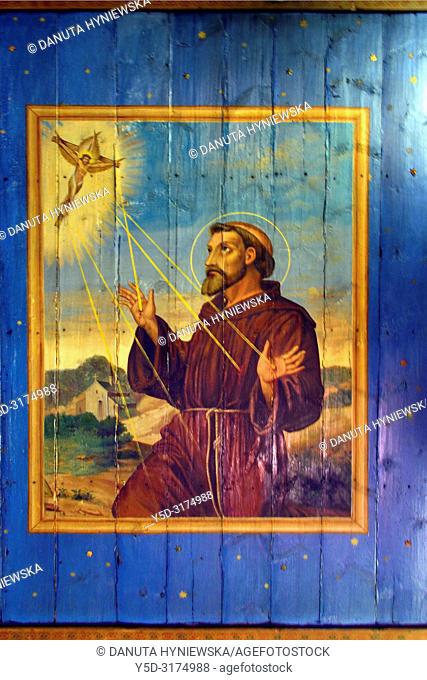 Historic oil painting of Francis of Assisi, in Polish Swietego Tomasza z Asyzu, painted on wooden ceiling of Kosciol Swietej Trojcy