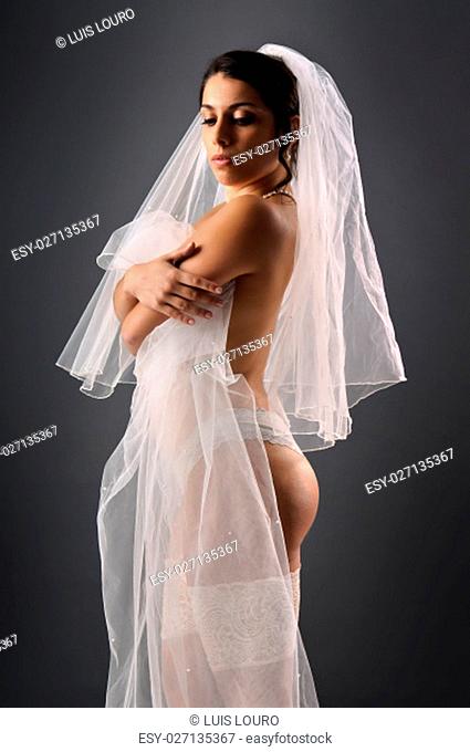 Beautiful bride posing in lingerie