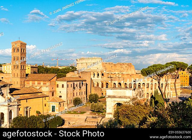 View of Forum of Rome and Colosseum a sunny summer day in Rome. It was for centuries the center of Roman public life