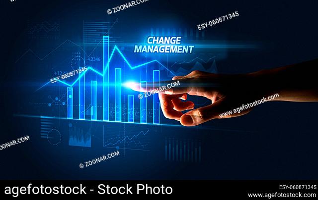 Hand touching CHANGE MANAGEMENT button, business concept