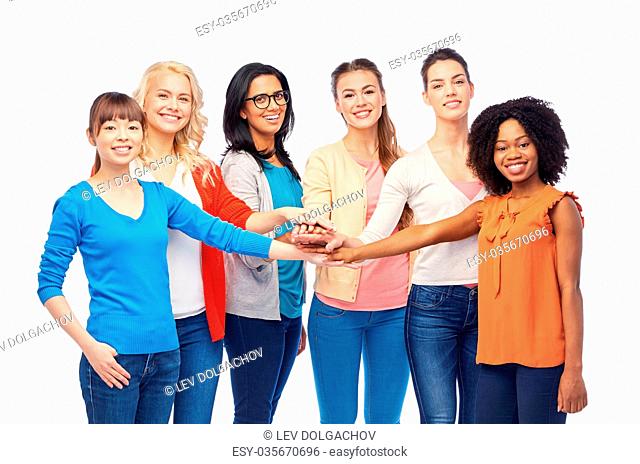 diversity, race, ethnicity and people concept - international group of happy smiling different women over white holding hands together