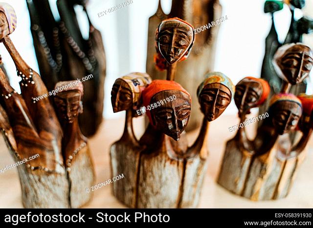 African tribal art for sale at a market stall. This artwork is generic and widely available across markets in South Africa