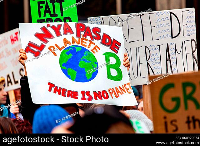 There is no planet b is shown on a homemade placard held by ecological demonstrators during a peaceful march in a city center