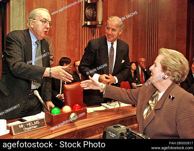 United States Senator Jesse Helms (Republican of North Carolina), Chairman, US Senate Armed Services Committee, left, welcomes US Secretary of State Madeleine...