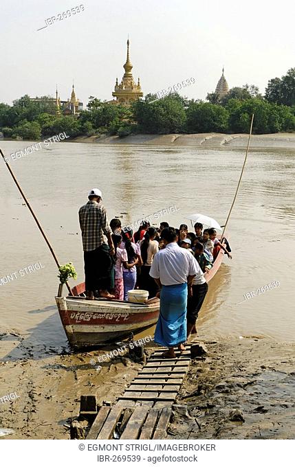 People entering a ferry over the Pazundaung river, Yangon, Myanmar