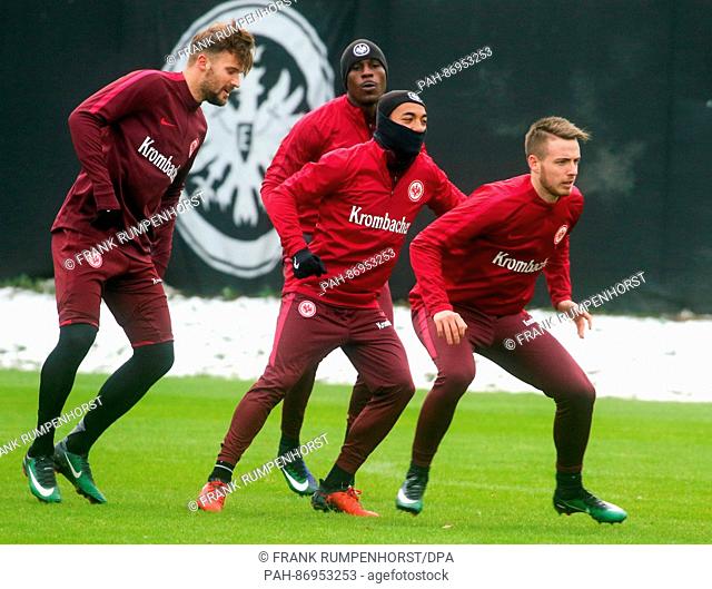 German soccer Bundesliga club Eintracht Frankfurt player Max Besuschkow (R) during his first training session with teammates Haris Seferovic (L)