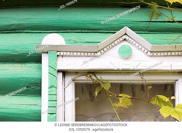 Fragment of window decoration of a wooden country house  Russia