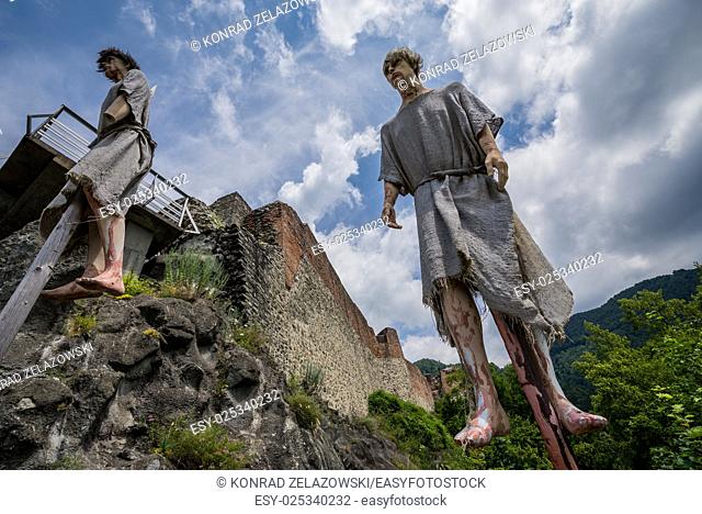Impalement scene in front of Ruined Poenari Castle on Mount Cetatea in Romania