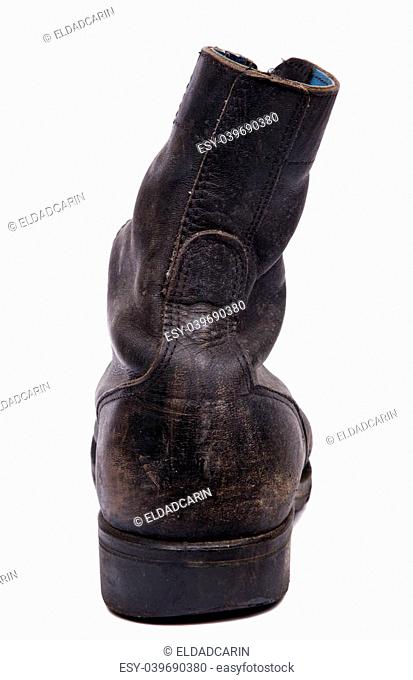 The back side of a very worn right boot, issued by the Israeli army (IDF). isolated on white background