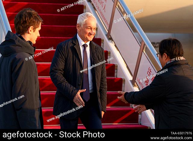 CHINA, BEIJING - NOVEMBER 20, 2023: Russia's First Deputy Prime Minister Andrei Belousov (C) steps off the plane on arrival at an airport