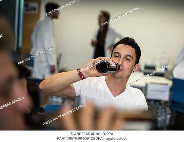 Subject Scholli drinks a beer in Mainz, Germany, 16 June 2017. The University of Mainz examines the effectivicty of an anti-hangover remedy in a scientific...