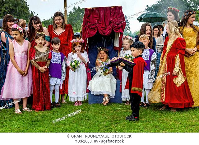 The Traditional Crowning Of The May Queen At The Medieval Fair Of Abinger, Surrey, UK