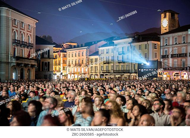 Film Festival Locarno with crowd and projector on piazza Grande in Ticino, Switzerland