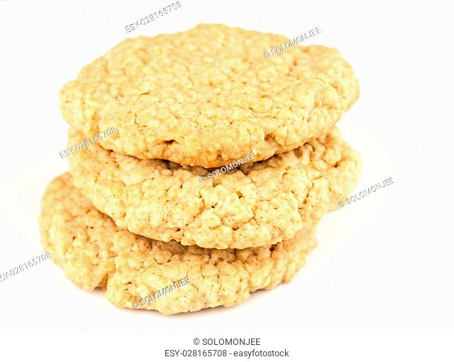 A set of fresh, homemade oatmeal cookies set on a white background