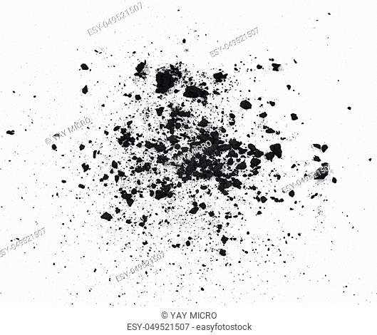particles of charcoal on a white background