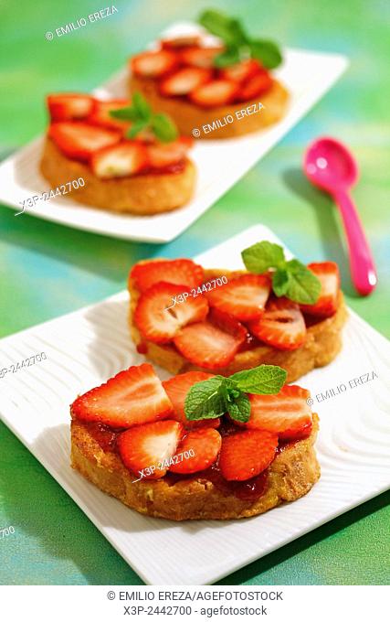 Torrijas with strawberries. Typical Spanish meal