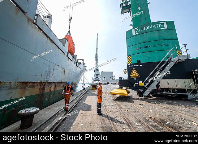 Illustration shows a ship being loaded at Zuidnatie, logistics and warehousing specialist, company plant in Antwerp harbor, Thursday 03 June 2021