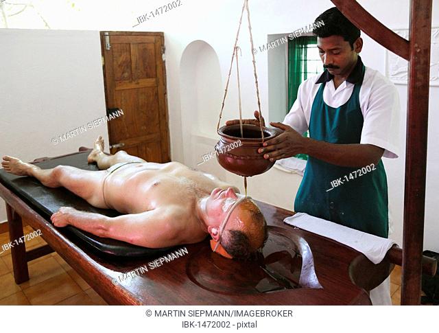 Shirodhara, oil being poured on the forehead, Ayurvedic treatment, Bethsaida Hermitage near Kovalam, Kerala, southern India, India, Asia