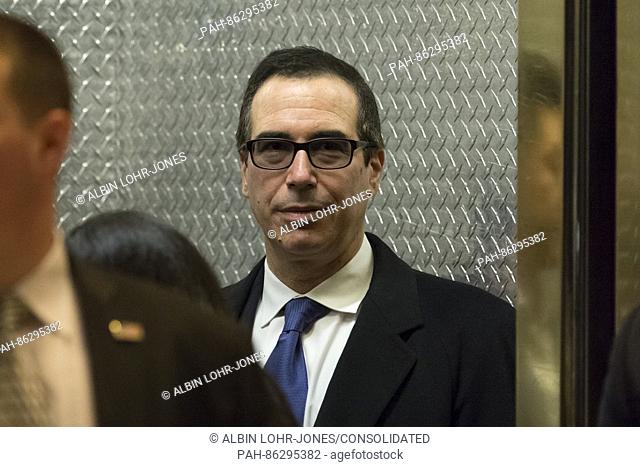 United States President-elect Donald Trump's nominee for Secretary of the Treasury Steven Mnuchin is seen waiting for an elevator lobby Trump Tower in New York