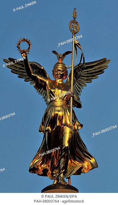 The so-called 'Goldelse' (lit. golden lizzy) stands tall on top of the Berlin Victory Column in front of a clear blue sky in Berlin, Germany, 3 March 2013