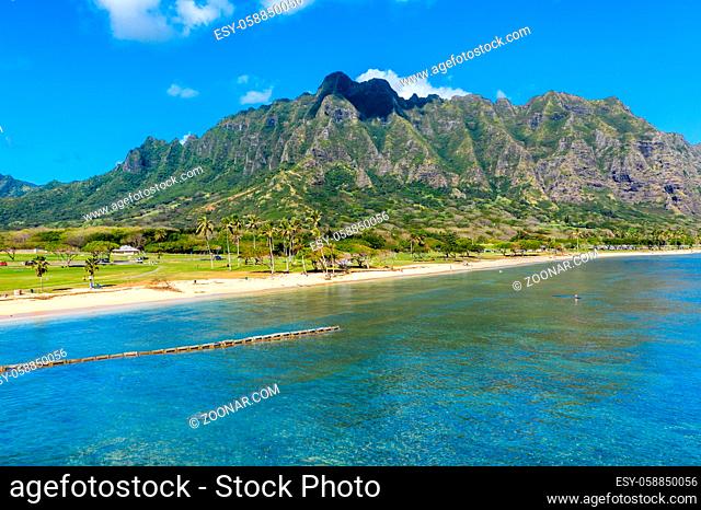 Aerial view of the beach and park at Kualoa with Ko'olau mountains in the background