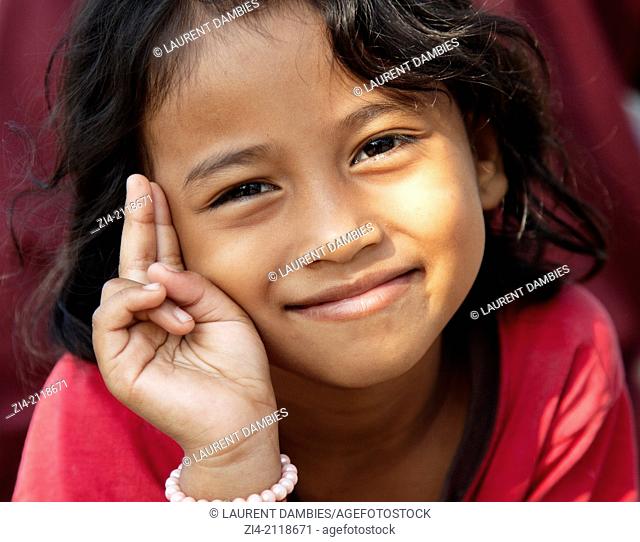 Young smiling Cambodian girl posing