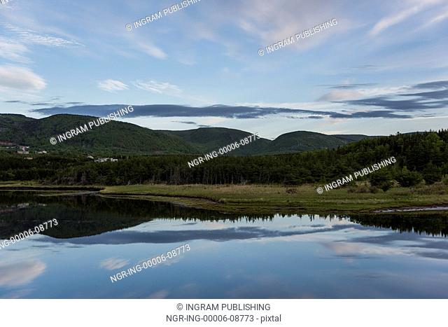 Scenic view of river with mountains in background, Margaree River, Cabot Trail, Cape Breton Island, Nova Scotia, Canada