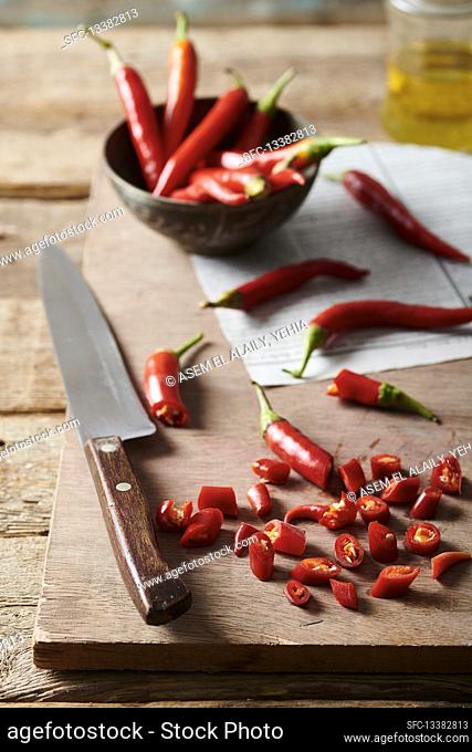 Chopping red chillies