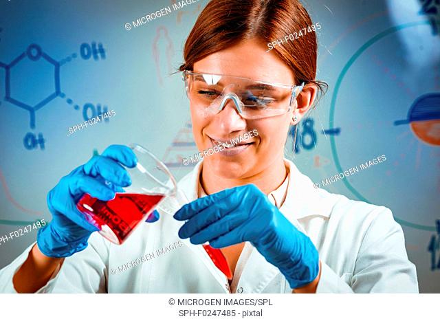 Biotechnology. Female scientist working in laboratory