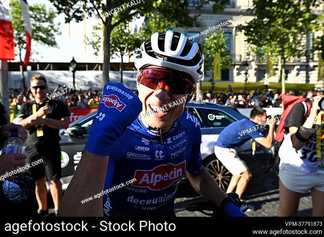 Belgian Jasper Philipsen of Alpecin-Deceuninck celebrates after winning stage 21, the final stage of the Tour de France cycling race