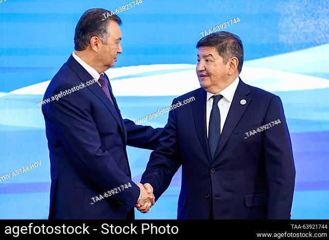 KYRGYZSTAN, BISHKEK - OCTOBER 26, 2023: Tajikistan's Prime Minister Kokhir Rasulzoda (L) and Kyrgyzstan's Cabinet of Ministers Chairman/ Head of the...