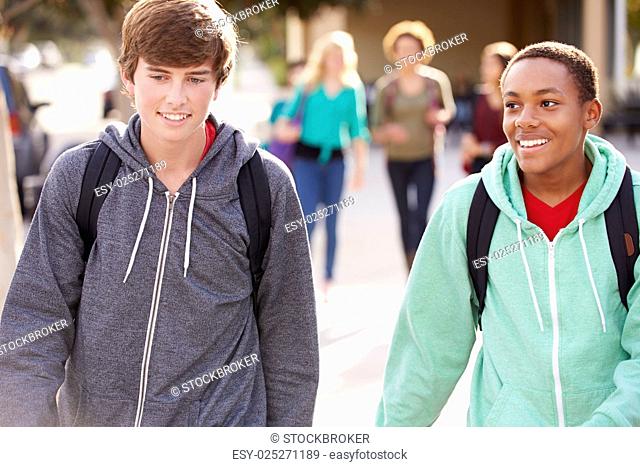Two Male Students Walking To High School