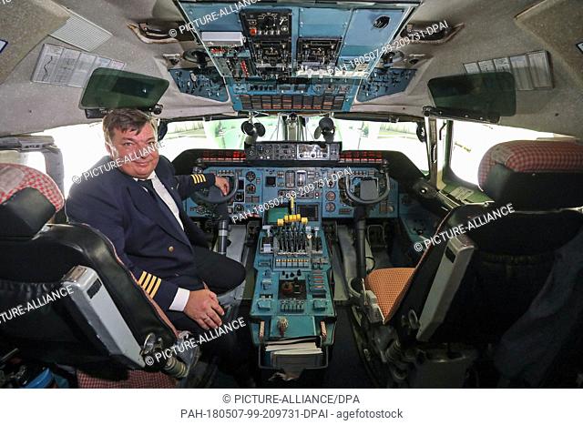 07 May 2018, Germany, Schkeuditz, Leipzig-Halle Airport: Pilot Dmitri Antonov sitting in an Anotonov 225's cockpit. The 84 -meter long