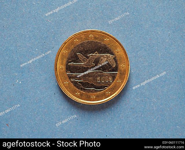 1 euro coin money (EUR), currency of European Union, Finland over blue background