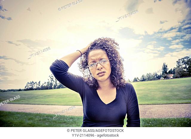 Young Hispanic woman in a park