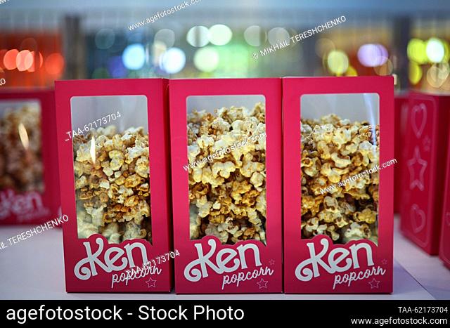 RUSSIA, MOSCOW - SEPTEMBER 14, 2023: Ken Box shaped packages of popcorn are pictured at the Moscow premiere of the 2023 comedy film Barbie at the Mori Cinema at...