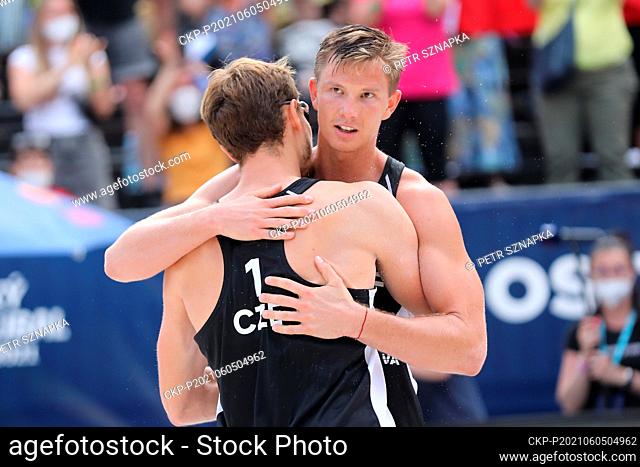 Ondrej Perusic, left, and David Schweiner of Czech Republic react during the Ostrava Beach Open 2021 tournament, part of the Beach Volleyball World Tour match...