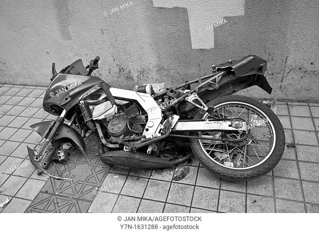 Old broken forgotten motorbike