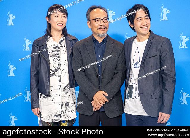 23 February 2023, Berlin: Director Liu Jian (M), David Wen-Wei Liang (music, r) and a guest arrive at the Photo Call for the film ""Art College 1994""