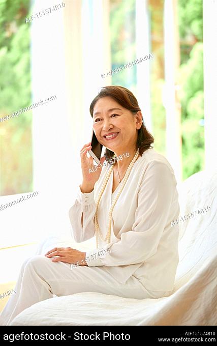 Senior Japanese woman at home