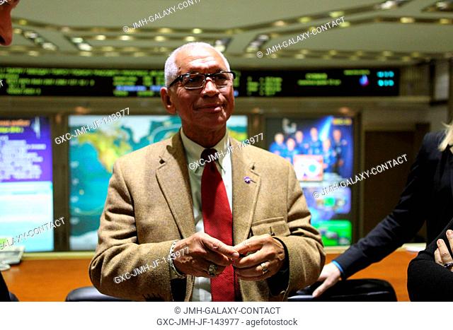 At the Russian Mission Control Center in Korolev, Russia, NASA Administrator Charles Bolden poses for pictures Nov. 20 as he awaited the docking of the Soyuz...