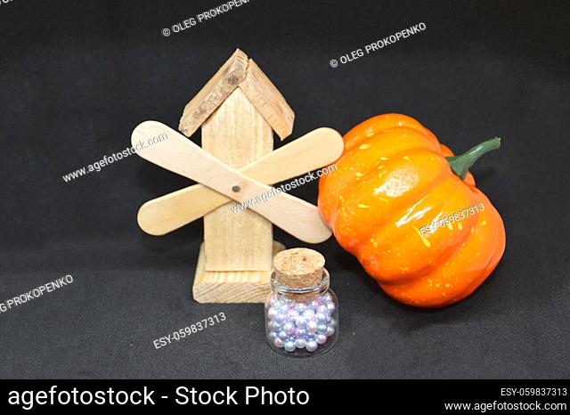 Ripe pumpkin for halloween on the background of a the holiday and mystical items