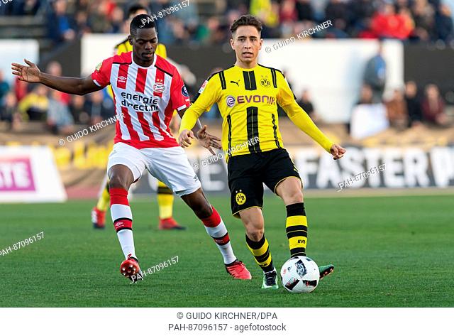 Dortmund's Emre Mor (r) and Eindhoven's Nicolas Isimat-Mirin in action during the soccer test match between Borussia Dortmund and PSV Eindhoven in La Linea de...