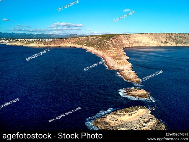 Aerial drone photography of Es Ribell rocky coastline and tranquil Mediterranean Sea bay. Mallorca or Majorca Island, popular travel destinations all year round...