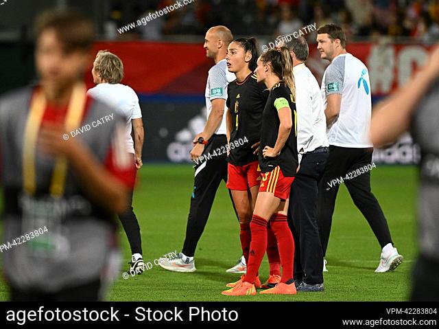 Belgium's Amber Tysiak and Belgium's Tessa Wullaert look dejected after losing the match between Belgium's national women's soccer team the Red Flames and...