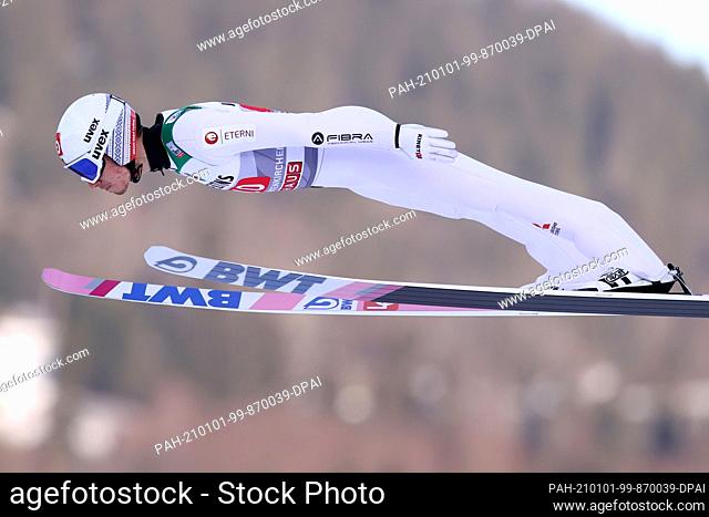 01 January 2021, Bavaria, Garmisch-Partenkirchen: Nordic skiing/ski jumping: World Cup, Four Hills Tournament, large hill, men, 1st round