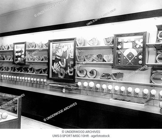 United States: c. 1960. A large display of baseball equipment and memorabilia
