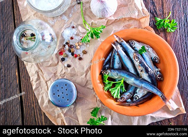 fish in bowl and on a table