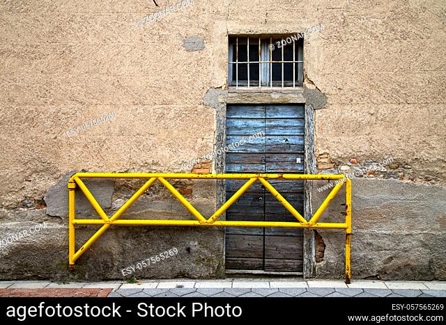 brown europe italy lombardy    in the milano old  window closed brick   abstract grate  door terrace